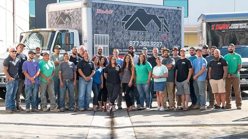 The Dalinghaus Foundation Repair team standing in front of the company trucks