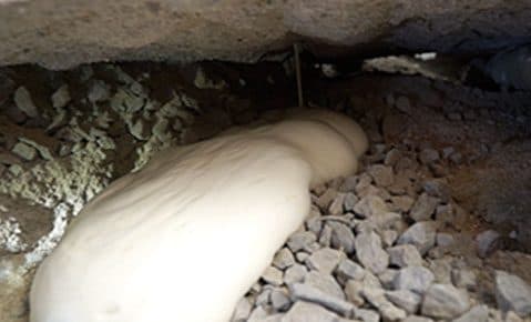 Dalinghaus Foundation Repair filling a concrete void under a concrete slab with structural foam injection.