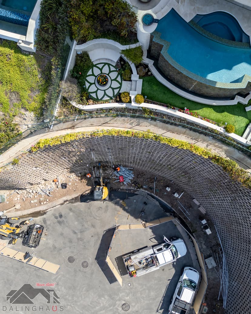 Dalinghaus Foundation Repair crew on site, excavating to perform concrete retaining wall structural reinforcement.