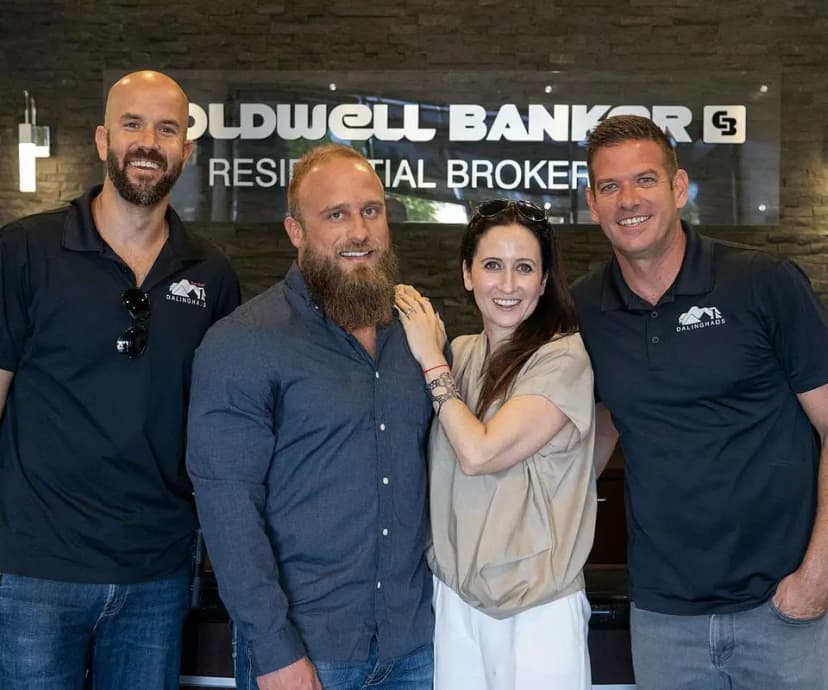 Dalinghaus Foundation Repair team members networking with Coldwell Banker realtors at an office.