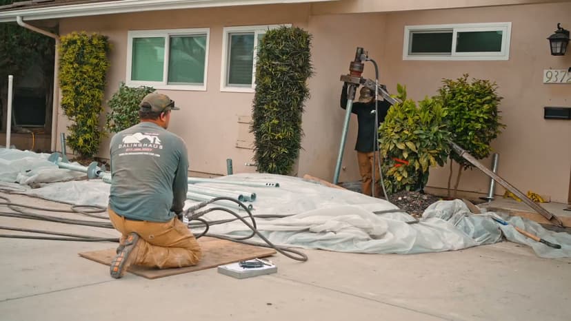 Dalinghaus Foundation Repair installing helical piers with a rotary drive head for foundation stabilization in La Habra.