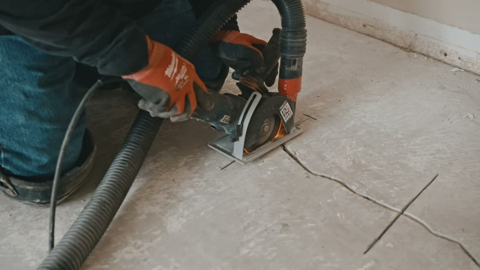 Dalinghaus Foundation Repair technician performing concrete crack grinding as preparation for epoxy injection in Laguna