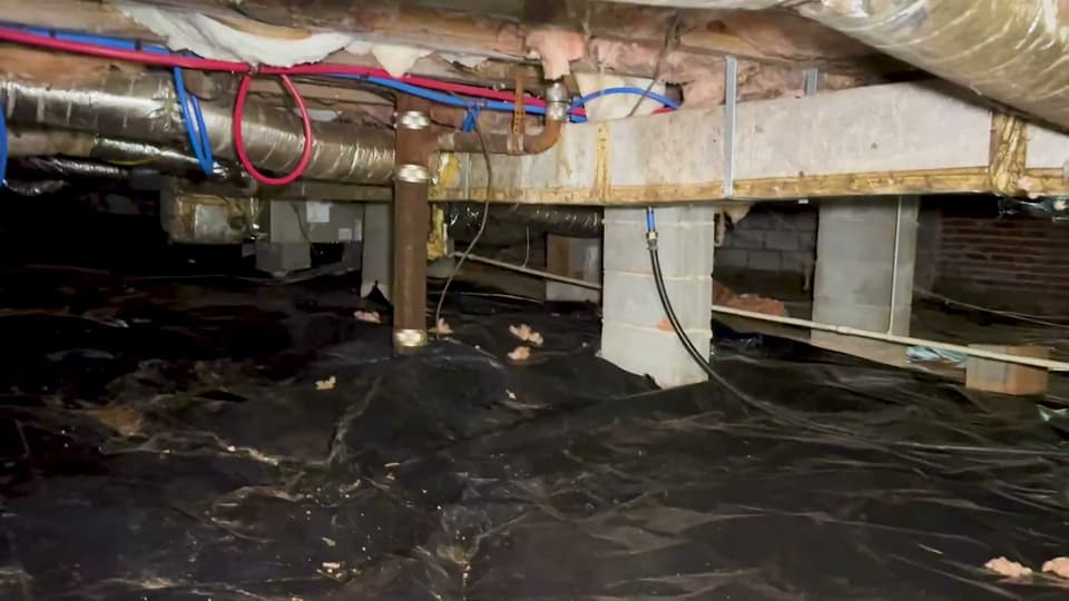 Dalinghaus Foundation Repair installing adjustable smart jacks in a crawl space with stabilization piers.