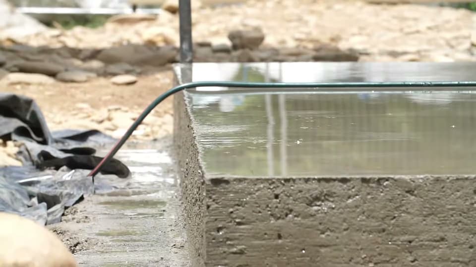 Dalinghaus Foundation Repair ensuring concrete curing and moisture management for a concrete slab in Why.